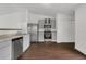 Updated kitchen with granite countertops, stainless steel appliances, and wood-look floors at 4836 Pierce Arrow Dr, Apopka, FL 32712