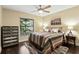 Cozy bedroom with natural light and hardwood floors at 518 Stephanie Ct, Lake Mary, FL 32746
