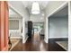 The foyer offers views of the pool, living spaces, and beautiful wood floors at 518 Stephanie Ct, Lake Mary, FL 32746