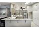 Bright kitchen with granite countertops, stainless steel appliances, and modern gray cabinets at 518 Stephanie Ct, Lake Mary, FL 32746