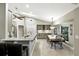 Bright kitchen with granite countertops, stainless steel appliances, and adjacent dining area at 518 Stephanie Ct, Lake Mary, FL 32746