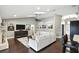 Comfortable living room with hardwood floors, television and views to another room at 518 Stephanie Ct, Lake Mary, FL 32746