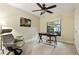 Comfortable office space with a desk, chair, and views of the outdoors at 518 Stephanie Ct, Lake Mary, FL 32746
