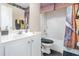 Cozy bathroom featuring shower-tub combo and vanity at 538 Majestic Oak Dr, Apopka, FL 32712