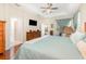 Spacious main bedroom with hardwood floors, wood furniture and fixtures, and soft decor creating a comfortable retreat at 538 Majestic Oak Dr, Apopka, FL 32712