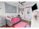 Bright bedroom with daybed, desk, ceiling fan and modern decor at 538 Majestic Oak Dr, Apopka, FL 32712