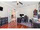 Inviting home office with hardwood floors, storage, and double french doors leading to other areas of the home at 538 Majestic Oak Dr, Apopka, FL 32712