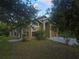 Charming single-story home with mature trees and well-maintained landscaping at 679 Midori St, Orlando, FL 32811
