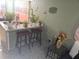 Bar with seating area near the kitchen at 679 Midori St, Orlando, FL 32811