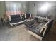 Modern living room furnished with contemporary sofas and sleek decor at 679 Midori St, Orlando, FL 32811