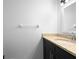 Bathroom with granite countertops, dark wood cabinets, and modern fixtures at 7219 Hunterdon Dr, Orlando, FL 32835
