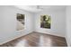 Bedroom with laminate floors, large windows at 7219 Hunterdon Dr, Orlando, FL 32835