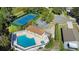 Community pool and tennis court with ample parking at 7219 Hunterdon Dr, Orlando, FL 32835
