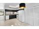 Bright kitchen featuring ample storage, modern appliances, and stylish wood-look flooring at 7219 Hunterdon Dr, Orlando, FL 32835