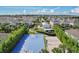 Aerial view of neighborhood amenities including a basketball court, volleyball court and playground at 7456 Marker Ave, Kissimmee, FL 34747