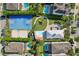 Aerial view of community amenities including a basketball court, playground, splash pad and swimming pools at 7456 Marker Ave, Kissimmee, FL 34747