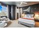 Themed bedroom featuring Star Wars mural, comfortable seating, TV, and a stylish bed at 7456 Marker Ave, Kissimmee, FL 34747