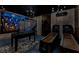 Finished basement game room features custom artwork and Roll and Score arcade games at 7456 Marker Ave, Kissimmee, FL 34747