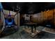 Finished basement game room features a basketball arcade, foosball table, and custom decor at 7456 Marker Ave, Kissimmee, FL 34747
