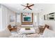 Comfortable living room area with neutral tones, modern decor and lots of light at 7456 Marker Ave, Kissimmee, FL 34747