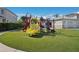 Bright and colorful playground area with slides, climbing structures, and safety surfacing for children at 7456 Marker Ave, Kissimmee, FL 34747
