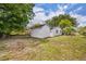 Detached garage in backyard with ample space, perfect for storage or a workshop at 7601 Aviano Ave, Orlando, FL 32819