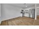 Modern kitchen with stainless steel appliances and plenty of countertop space, open to the living area at 7601 Aviano Ave, Orlando, FL 32819