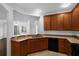 Open kitchen with breakfast bar overlooking living area, great for entertaining at 8192 Boat Hook Loop # 205, Windermere, FL 34786