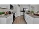 Clean kitchen featuring granite counters, stainless appliances, and ample cabinet space at 11158 Hollow Bay Dr, Winter Garden, FL 34787