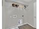 A laundry room featuring wire shelving and utility connections at 11158 Hollow Bay Dr, Winter Garden, FL 34787