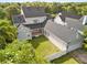Aerial view of a spacious backyard with lush green grass and a white picket fence at 11333 Camden Park Dr, Windermere, FL 34786