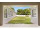 Charming backyard showcasing ample space, privacy fence, and the home's exterior at 11333 Camden Park Dr, Windermere, FL 34786