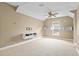 Upstairs bonus room includes a custom wall unit for media or storage at 11333 Camden Park Dr, Windermere, FL 34786