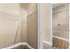 This is a walk-in closet with built in shelving and wood-style flooring at 11333 Camden Park Dr, Windermere, FL 34786