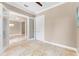Office with tile flooring, large windows, and a door leading to another room at 11333 Camden Park Dr, Windermere, FL 34786
