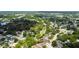An aerial view of the neighborhood showcasing the homes and surrounding trees at 116 Morning Glory Dr, Lake Mary, FL 32746