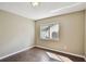 Bedroom with neutral walls, modern lighting, and wood-look flooring at 116 Morning Glory Dr, Lake Mary, FL 32746
