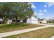 Charming single-Gathering home with well-maintained front yard and long driveway at 116 Morning Glory Dr, Lake Mary, FL 32746