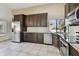 Modern kitchen with stainless steel appliances, granite countertops, and ample cabinet space for storage at 116 Morning Glory Dr, Lake Mary, FL 32746