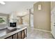 Bright and spacious living room featuring a unique fireplace and tiled flooring at 116 Morning Glory Dr, Lake Mary, FL 32746