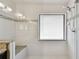 Spacious shower with tiled walls and a built in bench at 116 Morning Glory Dr, Lake Mary, FL 32746