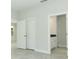 Bright bedroom with tile floors, white trim, and a closet with doors at 1328 Lombardi Ct, Poinciana, FL 34759