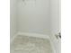 Walk-in closet with tile floors and white walls at 1328 Lombardi Ct, Poinciana, FL 34759