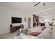 Spacious living area next to the kitchen, complete with stylish furniture and fixtures at 141 Claire Ln, Davenport, FL 33837