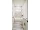 Bathroom featuring a tub, marble backsplash, and hardwood floors at 15621 Sw 37Th Cir, Ocala, FL 34473