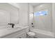 Stylish bathroom boasts a modern vanity and a tub-shower combo at 16057 Sw 17Th Ave, Ocala, FL 34473