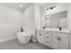 Elegant bathroom featuring a soaking tub, double vanity, and modern fixtures at 16057 Sw 17Th Ave, Ocala, FL 34473