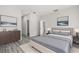 Comfortable main bedroom with soft decor and adjacent closet at 16057 Sw 17Th Ave, Ocala, FL 34473