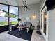 Relaxing covered patio space with comfortable seating and stylish decor at 1659 Canton Ln, Oviedo, FL 32765