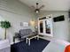 Relaxing covered patio space with comfortable seating and stylish decor at 1659 Canton Ln, Oviedo, FL 32765